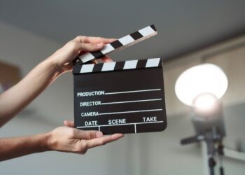 Film industry production set showing Indian content creation and entertainment economics with camera equipment