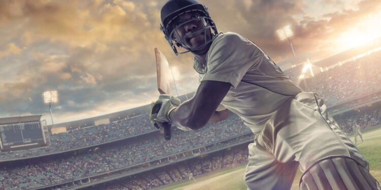 Match de ligue de cricket avec un stade bondé montrant l'économie du sport et l'industrie du divertissement en Inde