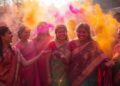 Holi festival celebration in India showing colorful powder and joyful crowds at cultural destinations