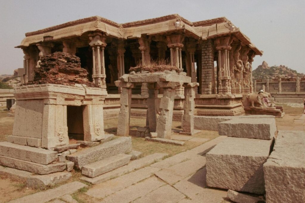 Ancient stone ruins at Hampi UNESCO site, a key stop on any heritage travel itinerary in India