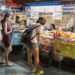 Busy street food stalls in Chandni Chowk Old Delhi one of India's most famous destinations for food travellers