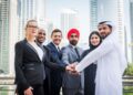 Indian and Gulf business professionals shaking hands representing the growing India GCC trade and investment partnership in 2026