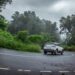 Screenshot_2026-06-30_121730 - INDIAwebzine A woman driving during monsoon road trips in India, with misty green hills visible through the windshield