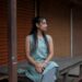 AIndian woman in a breathable linen kurta demonstrates why ethical fabrics are best choice for India's humid monsoon season.