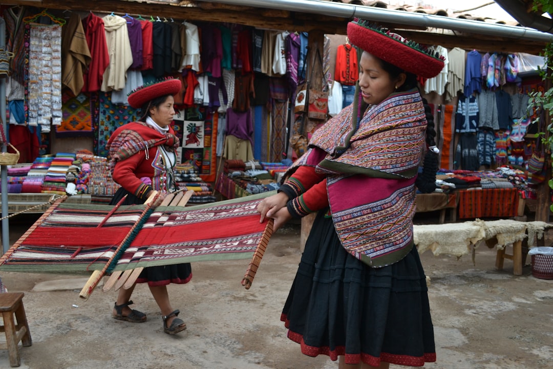 A local woman in traditional dress at a handicraft stall during Hemis Festival in Ladakh