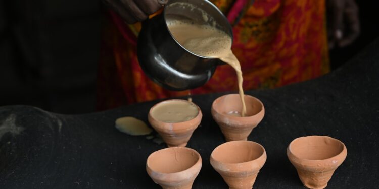 woman-pouring-south-indian-coffee-tumbler-unsplash - INDIAwebzine