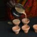 woman-pouring-south-indian-coffee-tumbler-unsplash - INDIAwebzine