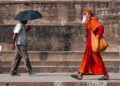 A monk walks past an ancient stupa on one of India's lesser-known Buddhist circuits in Odisha