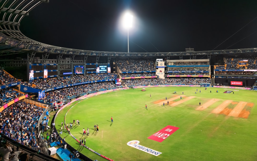 Fans celebrating as they watch the Women's Cricket World Cup match featuring India live