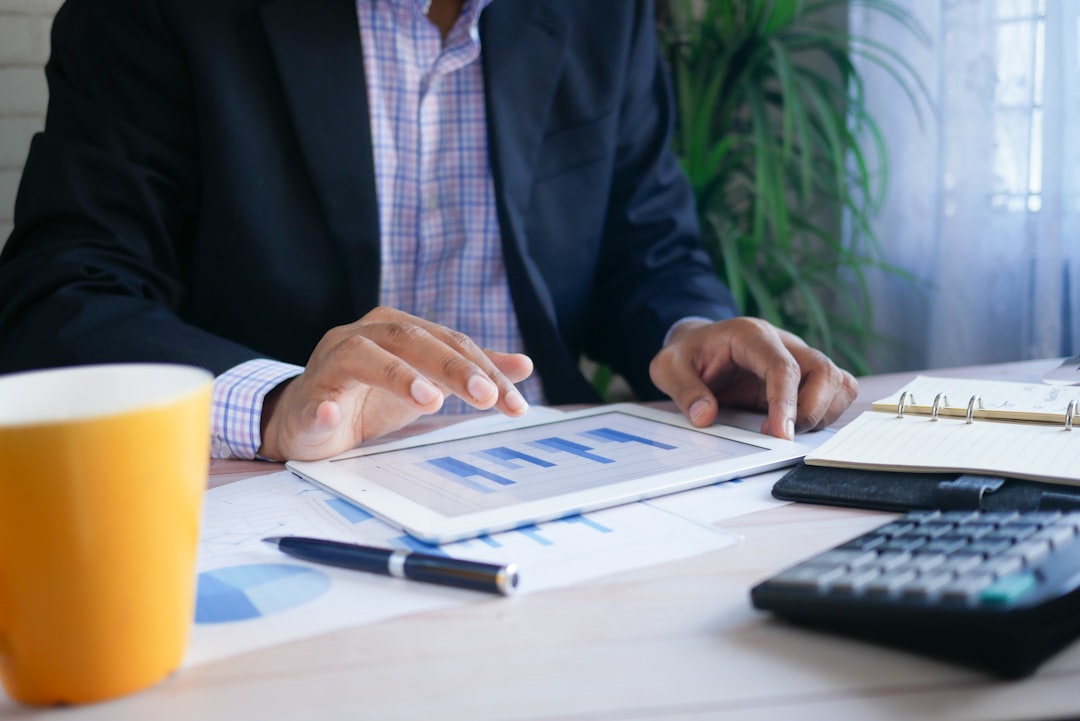 An Indian couple consulting a financial advisor about building a portfolio that includes an NPS tier II account
