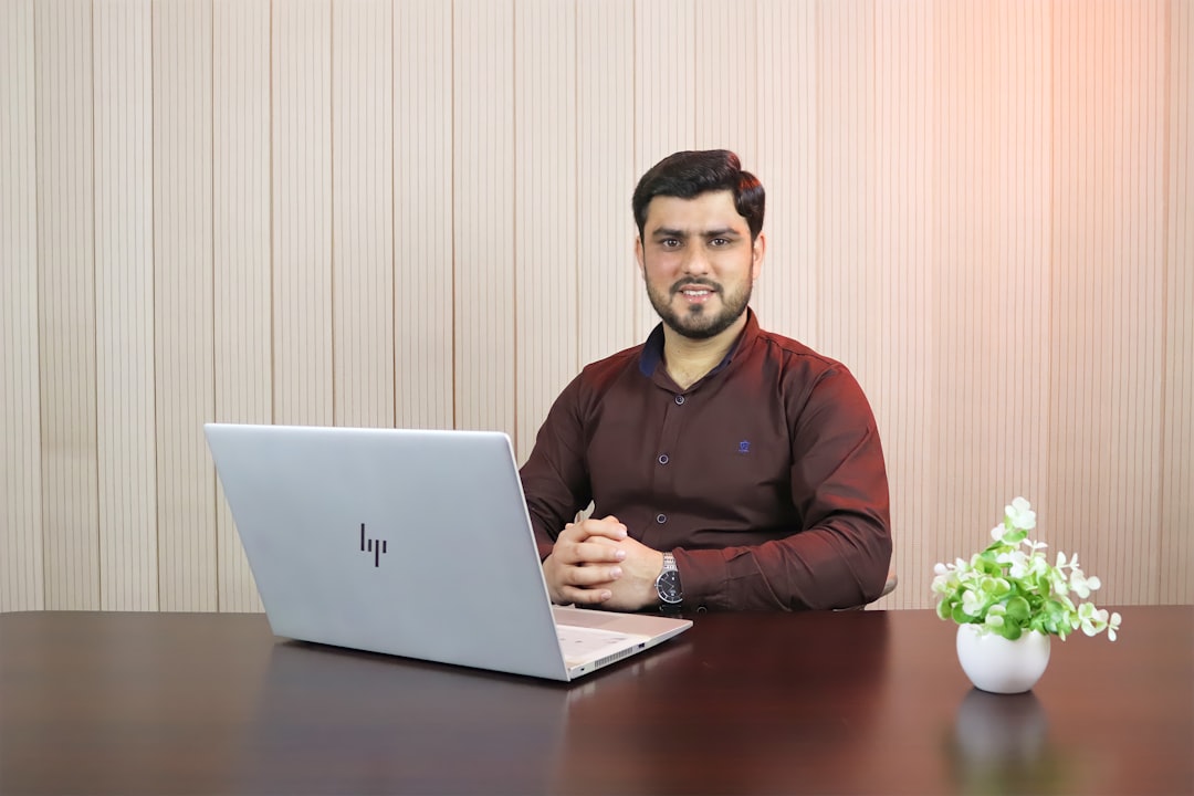 A young Indian entrepreneur logging into the eNPS portal to activate his NPS tier II account online