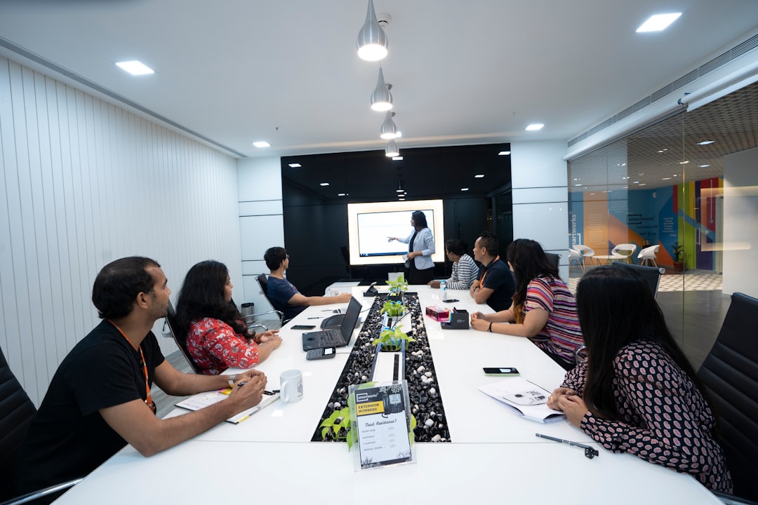 Indian startup founders discuss their IPO market listing strategy in a modern office in India