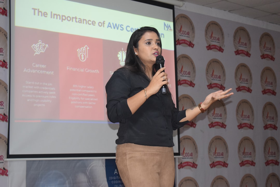 A woman entrepreneur presents her business plan to a panel, illustrating how startup funding is reaching new founders.