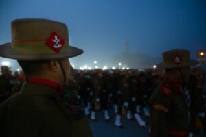 An Indian soldier stands at attention during a Kargil Vijay Diwas memorial ceremony in Ladakh