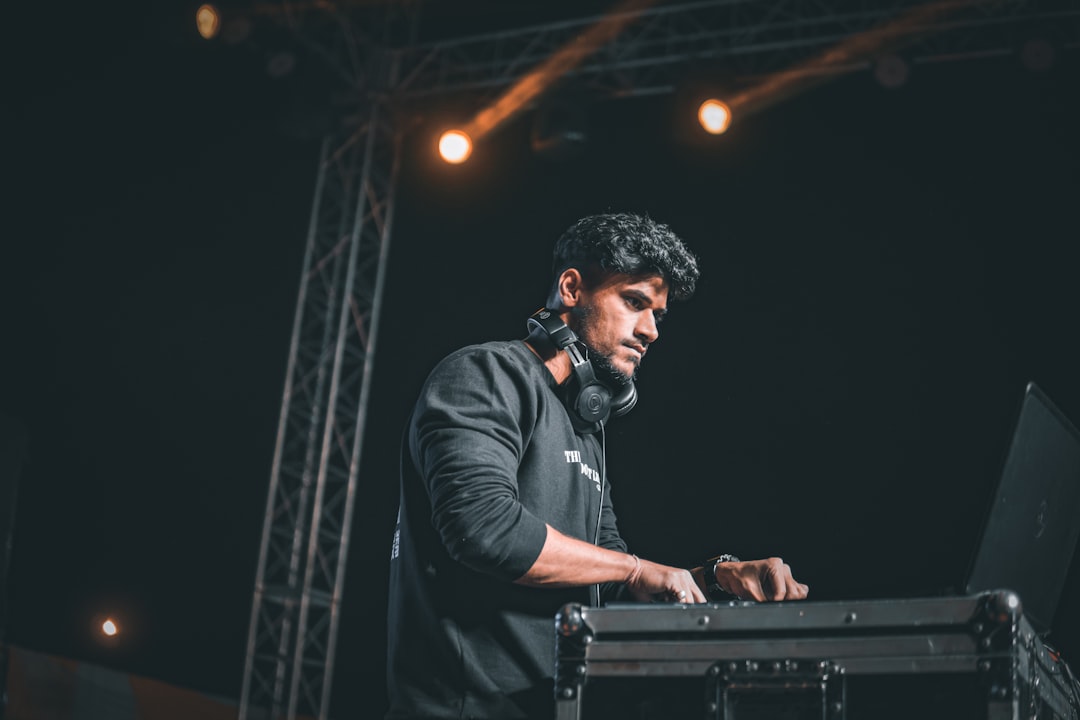 A young Indian musician uploads her music through a digital label platform to reach streaming audiences worldwide