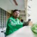 young-man-using-food-delivery-app-smartphone-unsplash - INDIAwebzine A young Indian man browses a food delivery platform on his smartphone, reflecting the surge in food delivery demand.