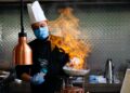 indian-chef-plating-curry-unsplash - INDIAwebzine An Indian-origin chef carefully plates a monsoon flavours curry dish at a modern Singapore restaurant