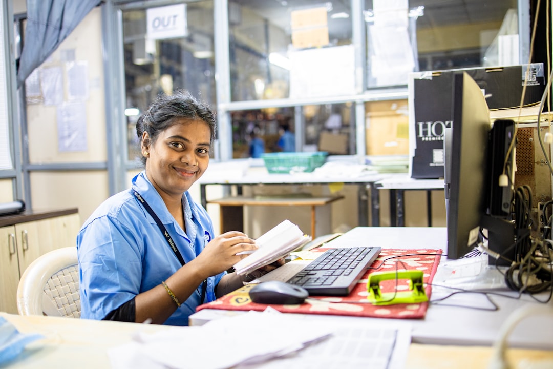 A logistics worker preparing packages as part of a seller's festive procurement fulfillment plan