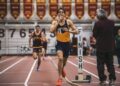 indian-runner-indoor-track-unsplash - INDIAwebzine A young Indian athlete running on an indoor track during monsoon training, focused and in full stride