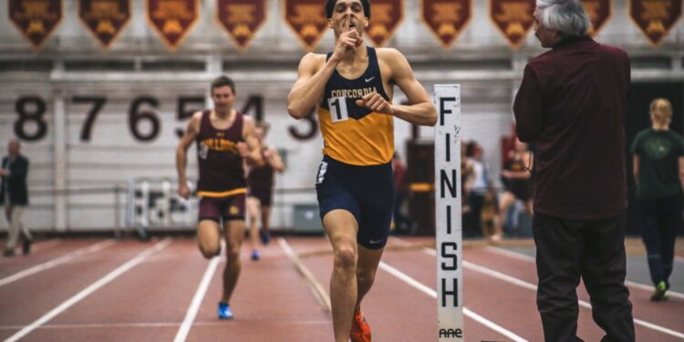 indian-runner-indoor-track-unsplash - INDIAwebzine A young Indian athlete running on an indoor track during monsoon training, focused and in full stride