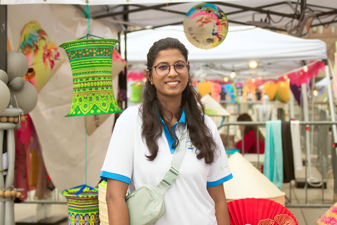 An Indian entrepreneur at a market discussing a product showing how businesses are built on customer relationships
