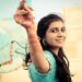 indian-woman-festive-kurta-celebration-unsplash - INDIAwebzine A woman wearing a breathable handloom kurta at an Indian festive gathering, showcasing festive fashion.