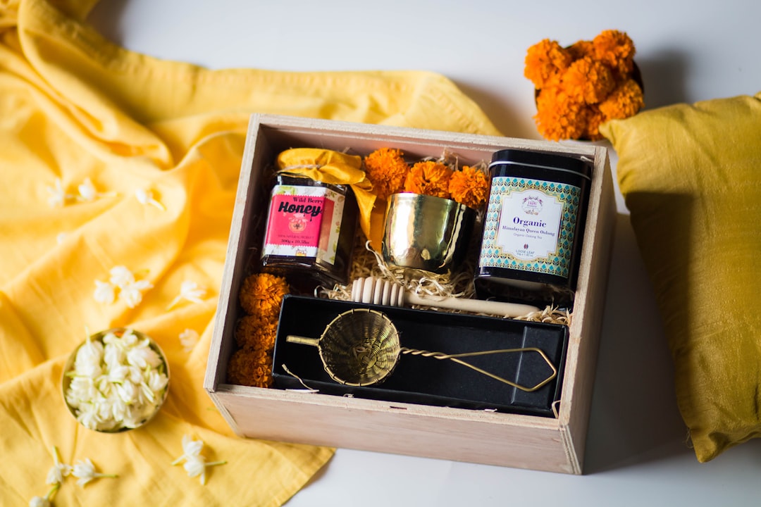 A young Indian woman opens a personalised gift hamper as part of modern Raksha Bandhan gifting traditions