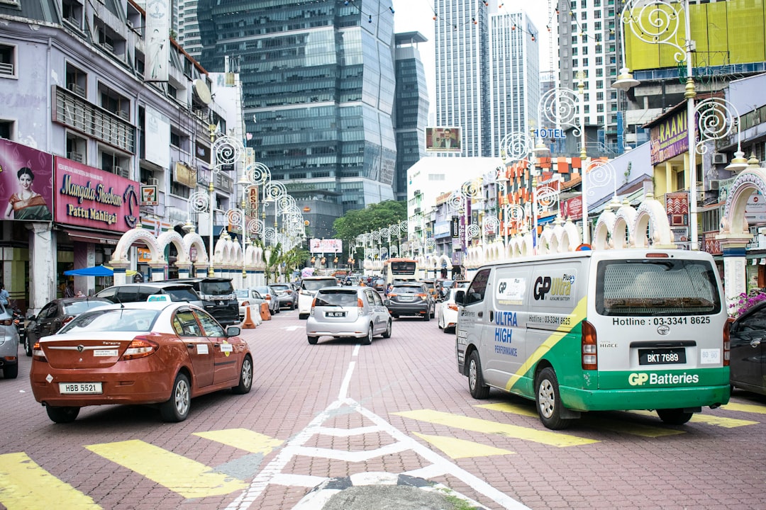 Shoppers and vendors in a Kuala Lumpur market district where festive procurement brings Indian-origin entrepreneurs.