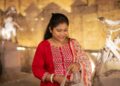 modern-indian-woman-making-paper-unsplash - INDIAwebzine A woman forms a sheet of cotton rag paper by hand, demonstrating the local materials used in a handmade journal practice.