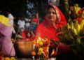 woman-devotee-midnight-temple-india-unsplash - INDIAwebzine A woman devotee taking part in Janmashtami celebrations at a lit temple in Mathura at midnight