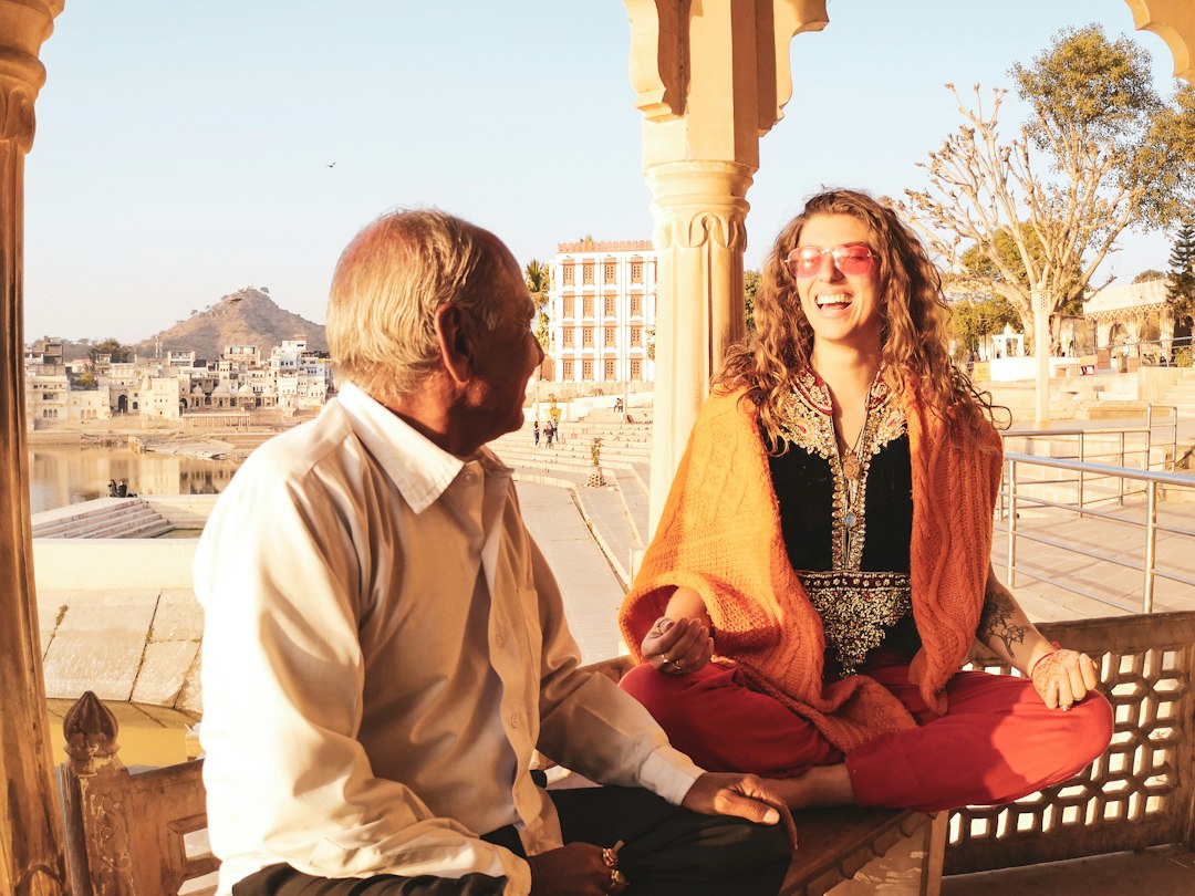 An Ayurvedic practitioner guiding a patient through a personalised Ayurvedic detox plan in preparation for India's season