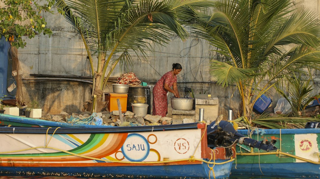 A couple eating at a small seafood shack on the Konkan coast, a classic stop on coastal drives in India in September