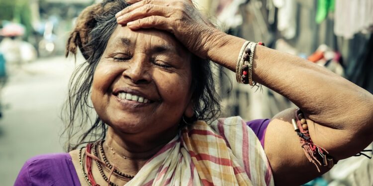 indian-woman-applying-face-paste-unsplash - INDIAwebzine A young Indian woman applying ubtan paste to her face as part of her traditional skincare ritual