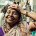 indian-woman-applying-face-paste-unsplash - INDIAwebzine A young Indian woman applying ubtan paste to her face as part of her traditional skincare ritual