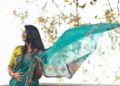 A woman draping a handloom saree at home as part of her festive reset before the celebration season in India
