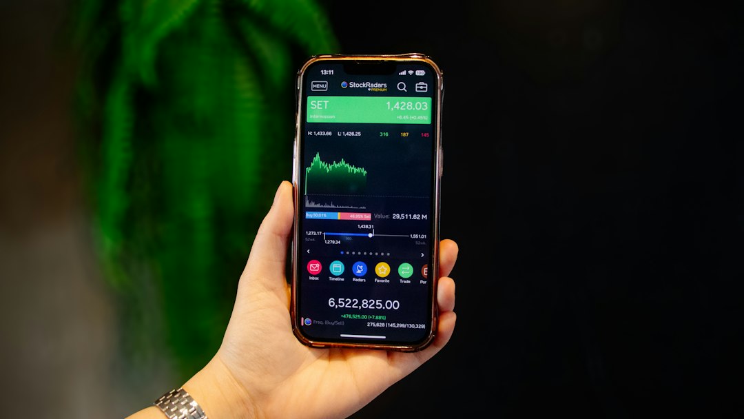 A young Indian woman uses a broker app to buy REITs in India units on her smartphone