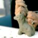 Artisan shaping Bengal terracotta horse in Panchmura workshop