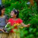 Host welcoming guests outside one of Kerala's backwater homestays